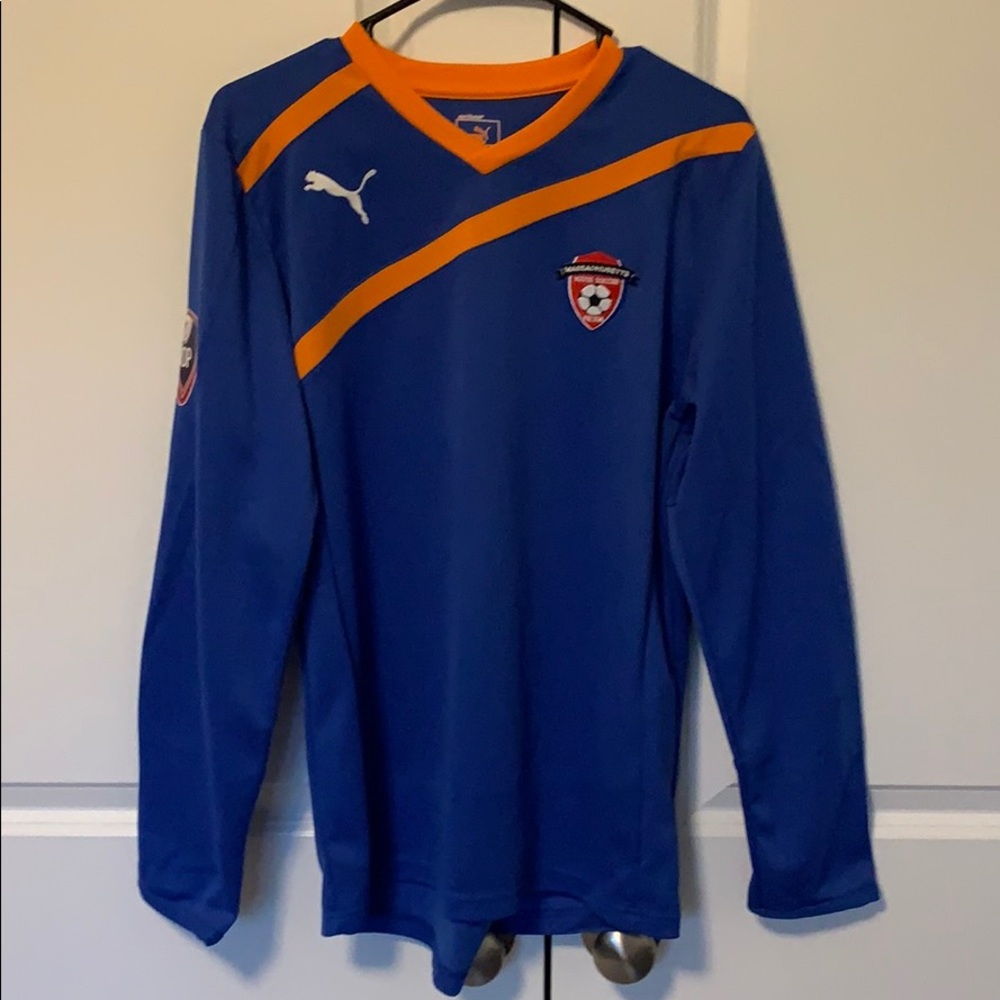 Once used goalie jersey with elbow padding.
